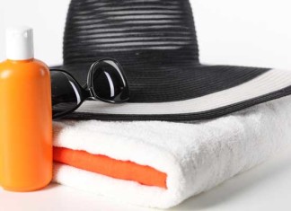 Sun Creams Slow Down Skin Aging hat, towel, sun cream, sunglasses