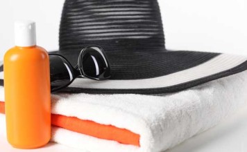 Sun Creams Slow Down Skin Aging hat, towel, sun cream, sunglasses